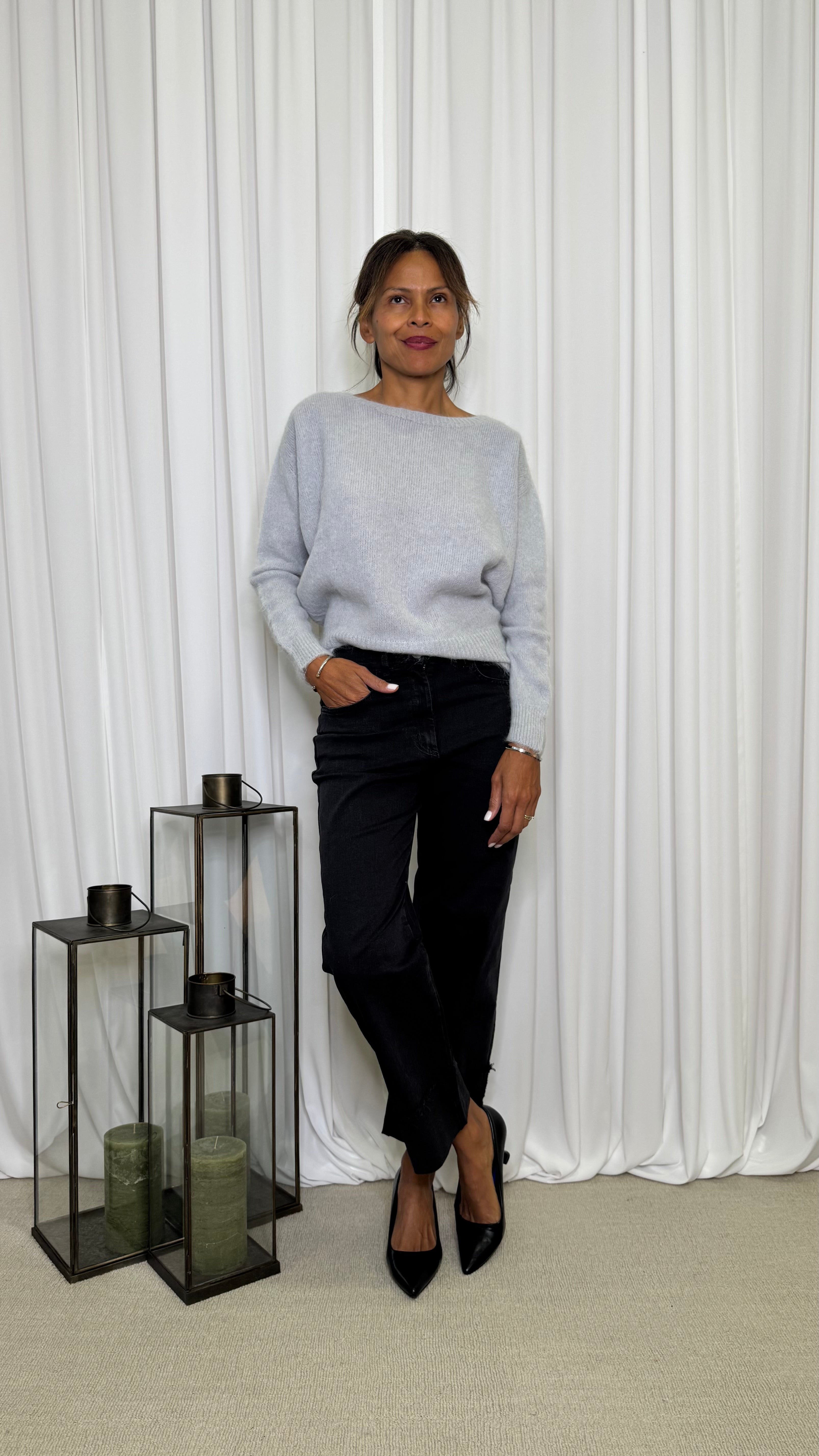 PANTALONE JEANS CON RISVOLTO ALTO