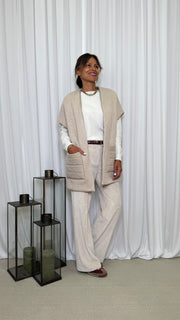 GILET CON PARTICOLARI TASCONI IN PIUMINO