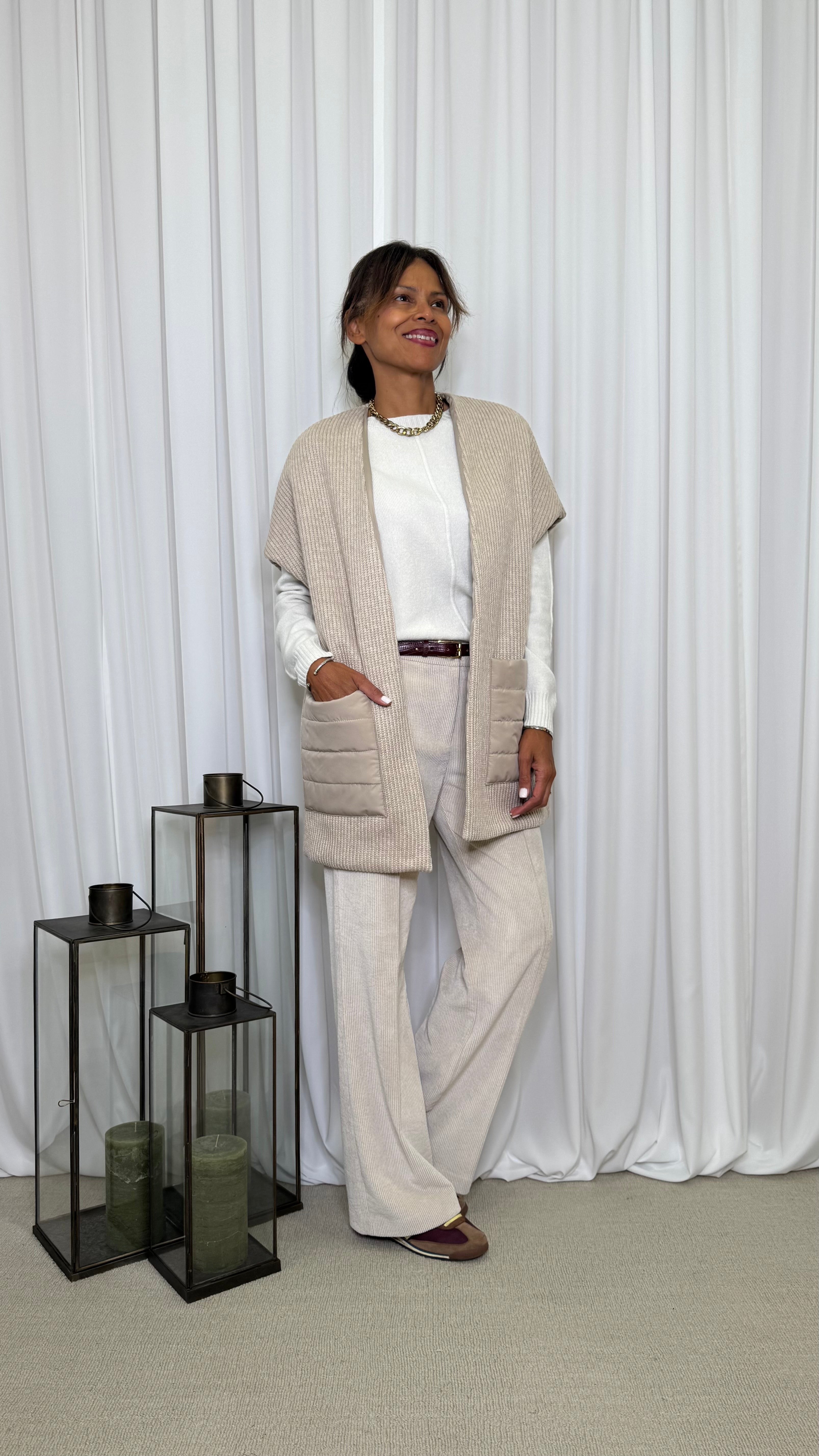 GILET CON PARTICOLARI TASCONI IN PIUMINO