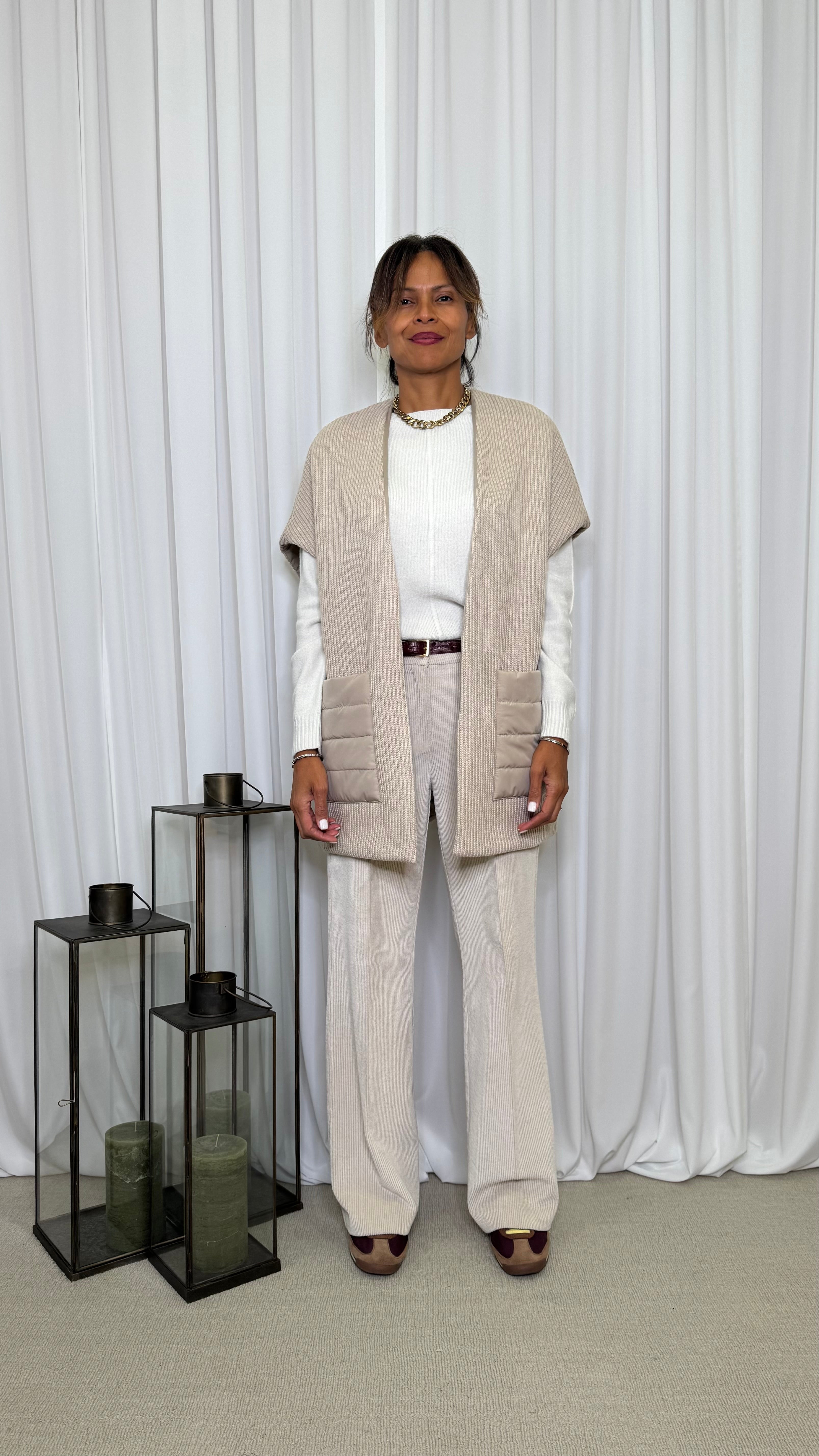 GILET CON PARTICOLARI TASCONI IN PIUMINO