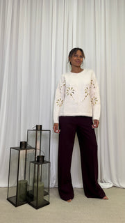 MAGLIA CON FIORI PAILLETTES