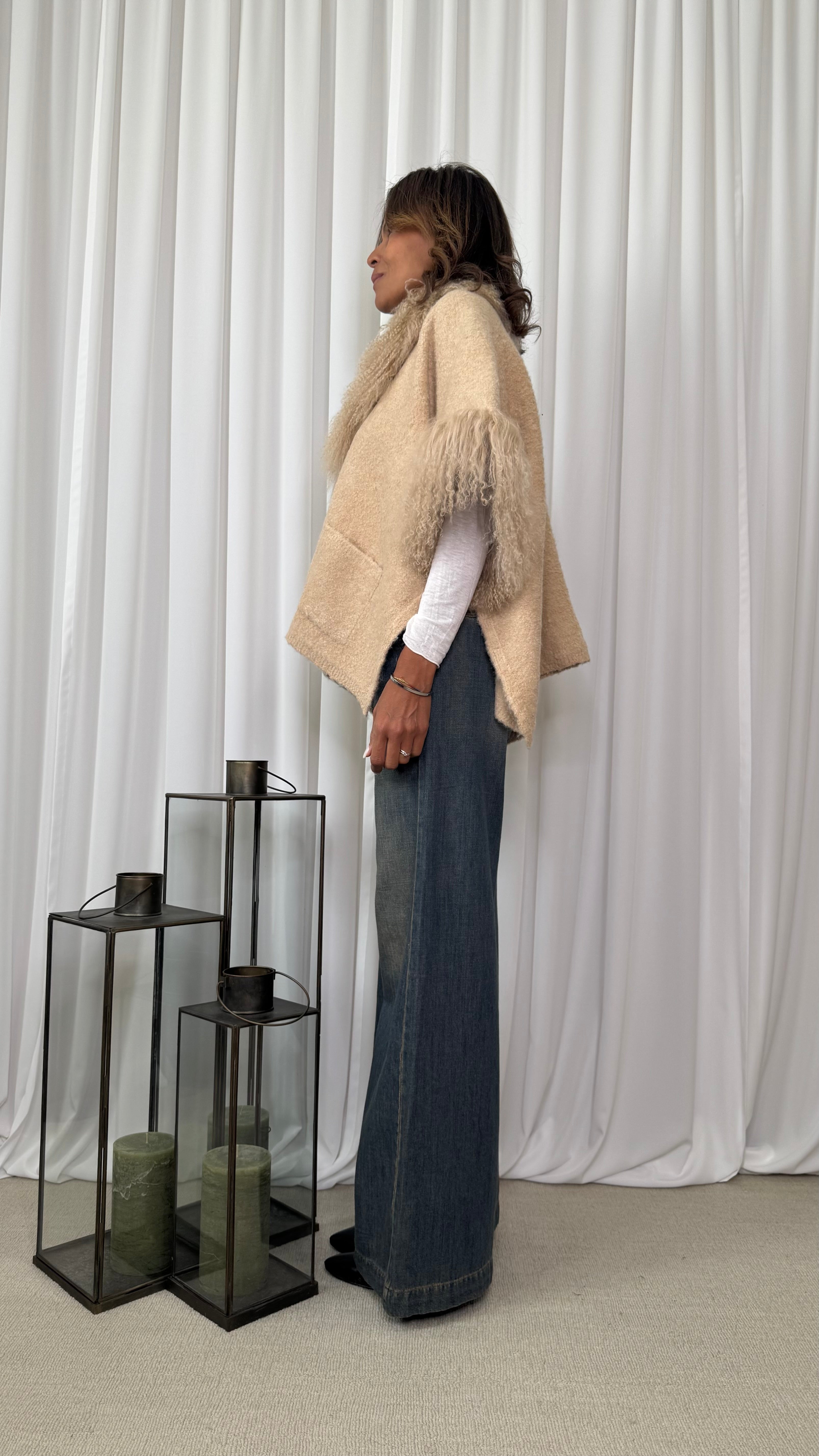 CAPE WITH MONGOLIAN FUR EDGES