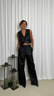 GILET CON PAILLETTES E CHIUSURA A BOTTONI